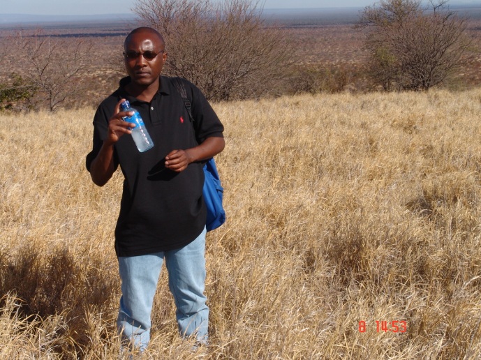 Picture of Mr Sedimo, Cartographer, in the field